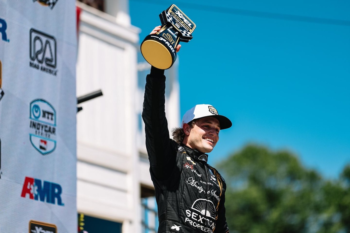 video:-santino-ferrucci-celebrates-indycar-podium-with-beer-from-a-fan